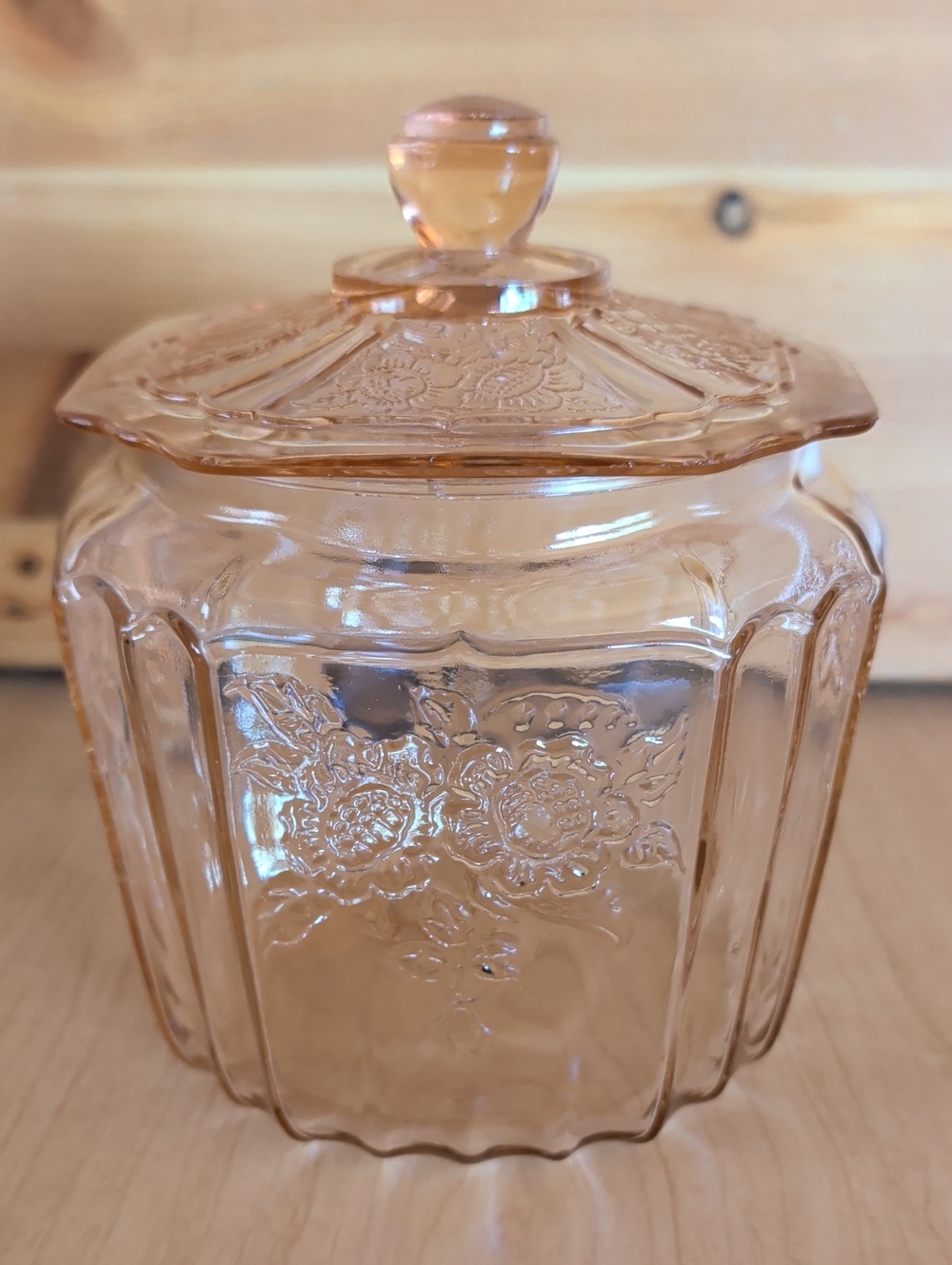 VTG. Pink Pressed Glass Cookie Jar with Lid and Floral Motif.